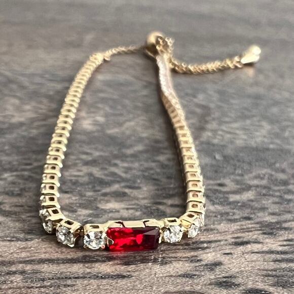 Adjustable rhinestone and ruby tone studded gold simple elegant bracelet - Picture 1 of 4